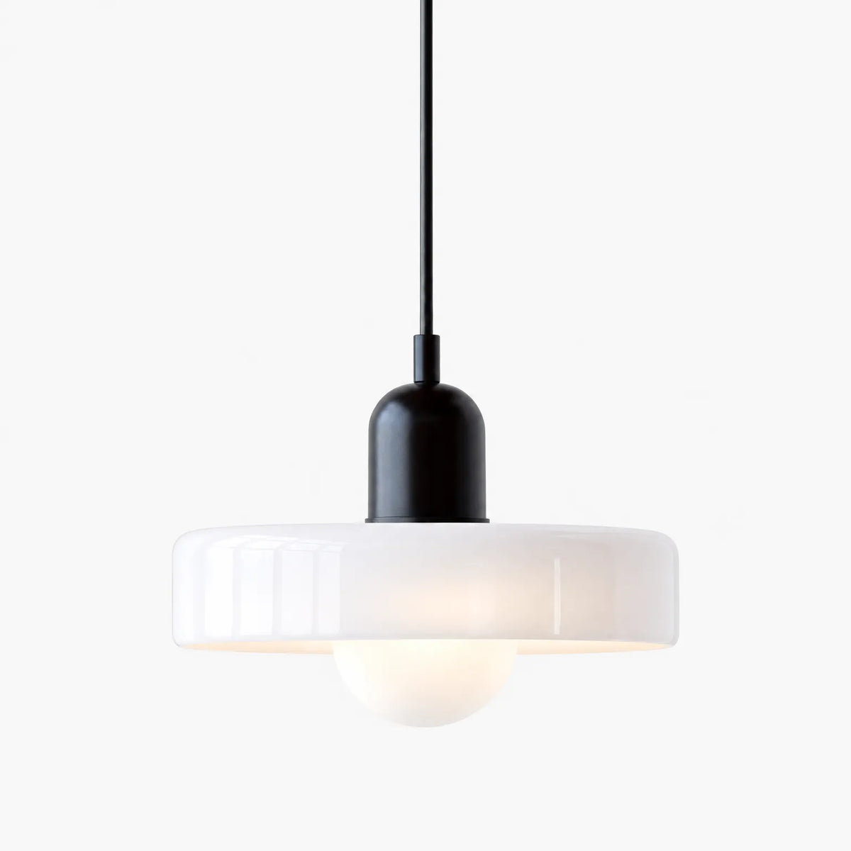 Glasto - Glass Pendant Light Illuminating Dining Spaces