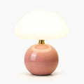 Glowveil - Compact Mushroom Shaped Table Lamp Lighting Up A Bedside Table At Night
