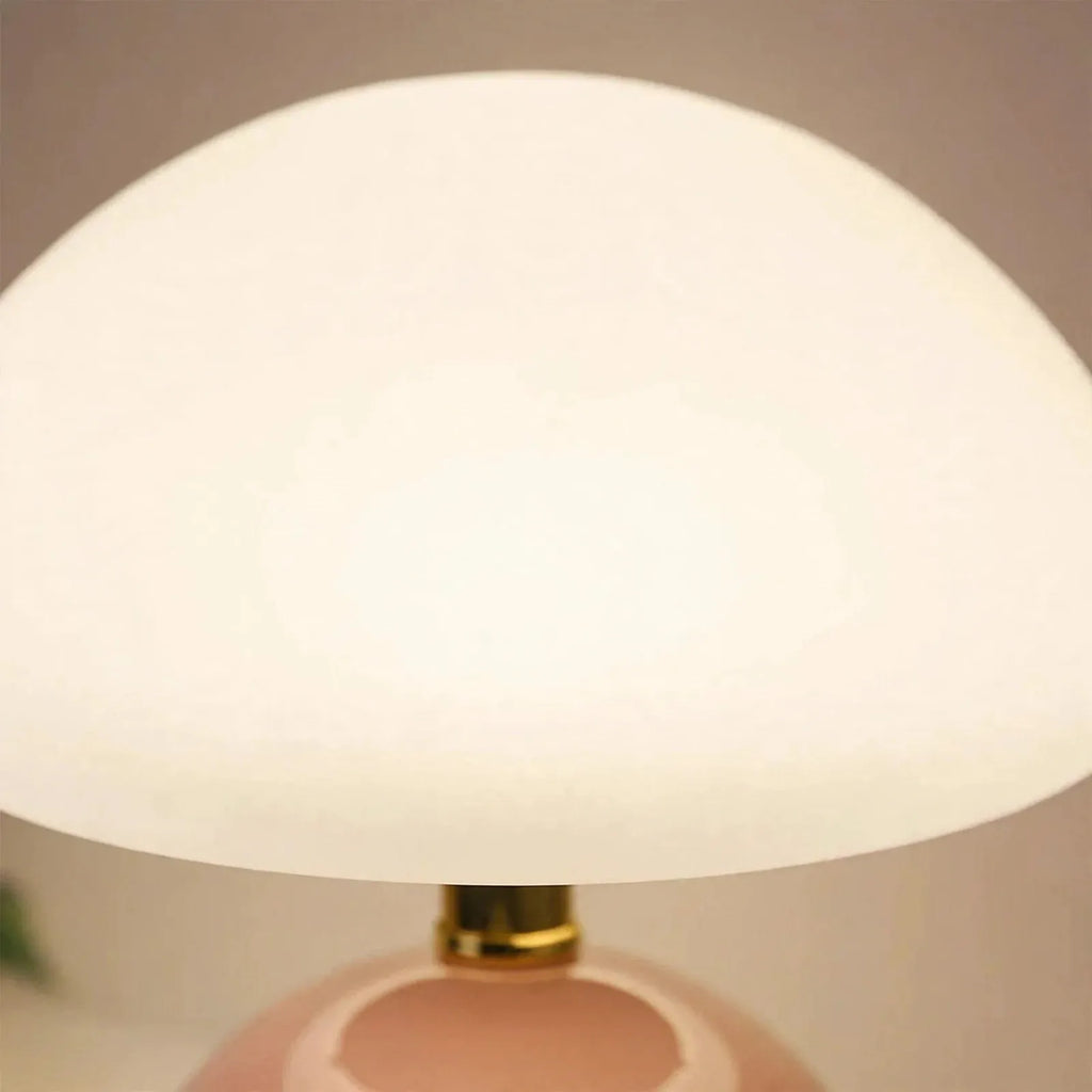 Glowveil - Compact Mushroom Shaped Table Lamp Lighting Up A Bedside Table At Night