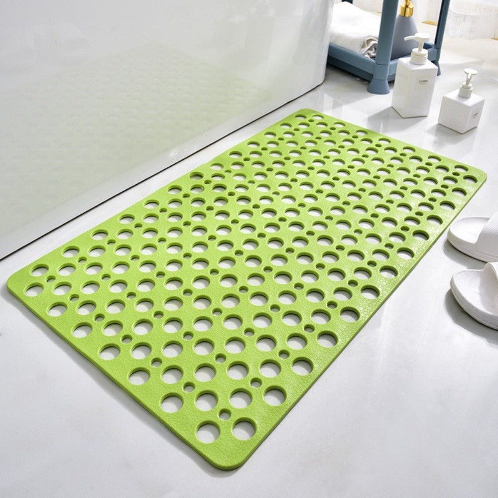 Perforated non-slip bath mat with repeated circular holes
