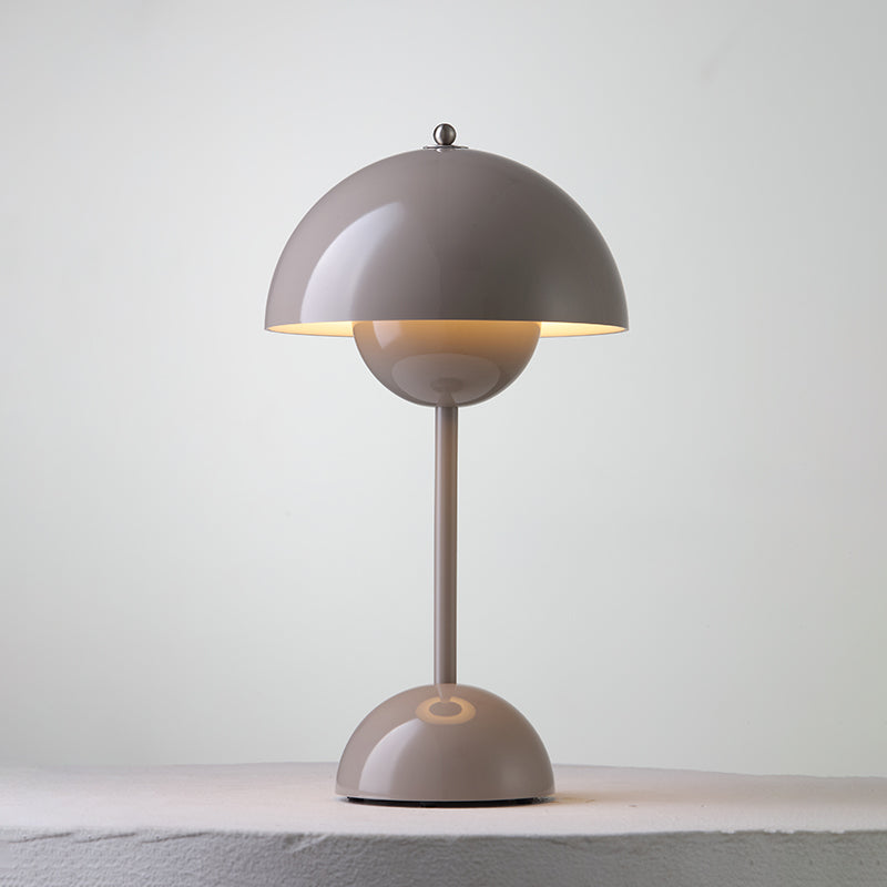 Portable dome table lamp with layered rounded shade and base