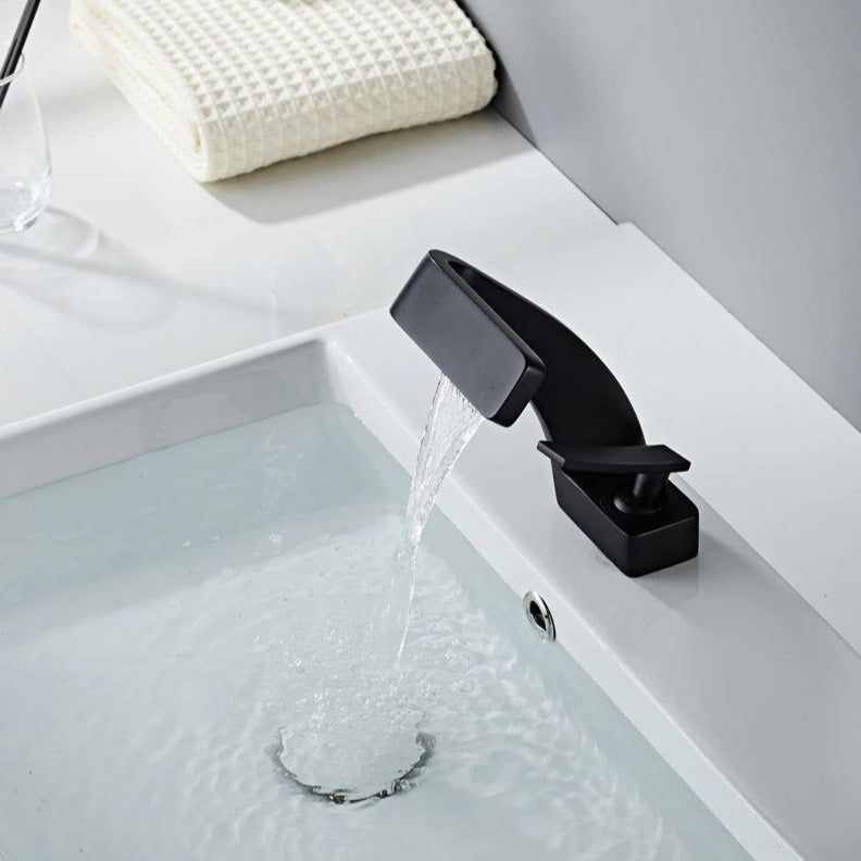 Curved basin mixer tap with rectangular waterfall spout and single lever