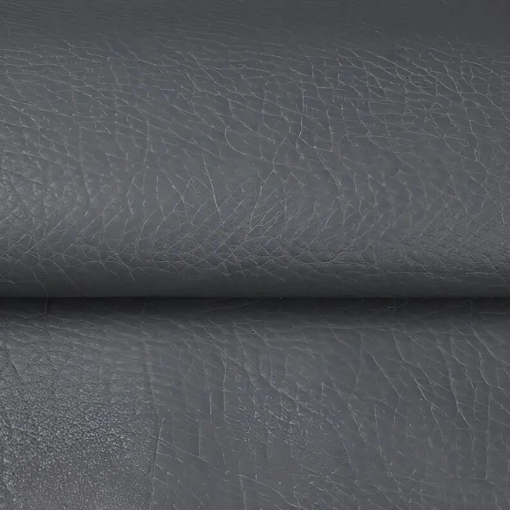 Peel-off repair patch sheet being separated from its white backing