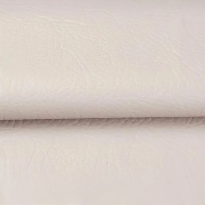 Peel-off repair patch sheet being separated from its white backing