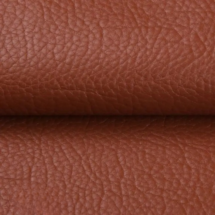 Peel-off repair patch sheet being separated from its white backing