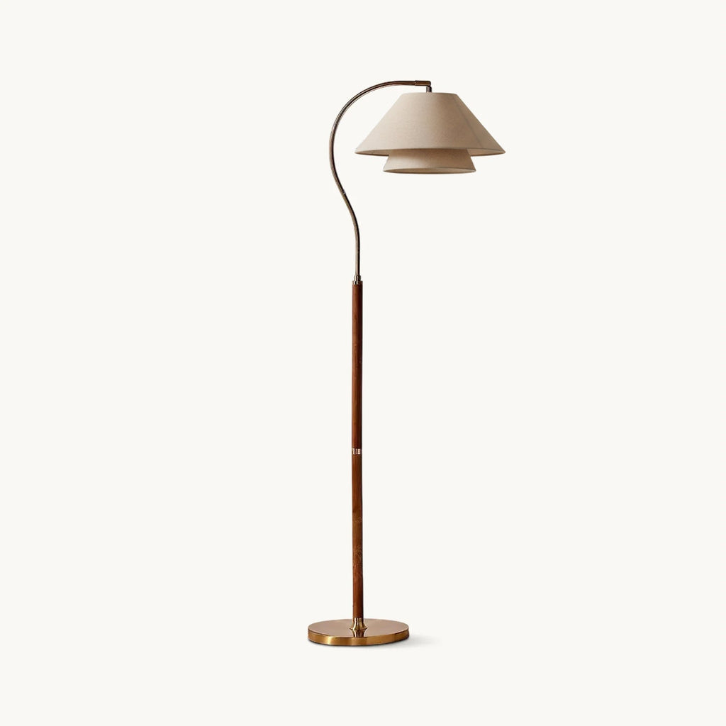 Brown floor lamp with curved arm, beige double shade and gold-tone base
