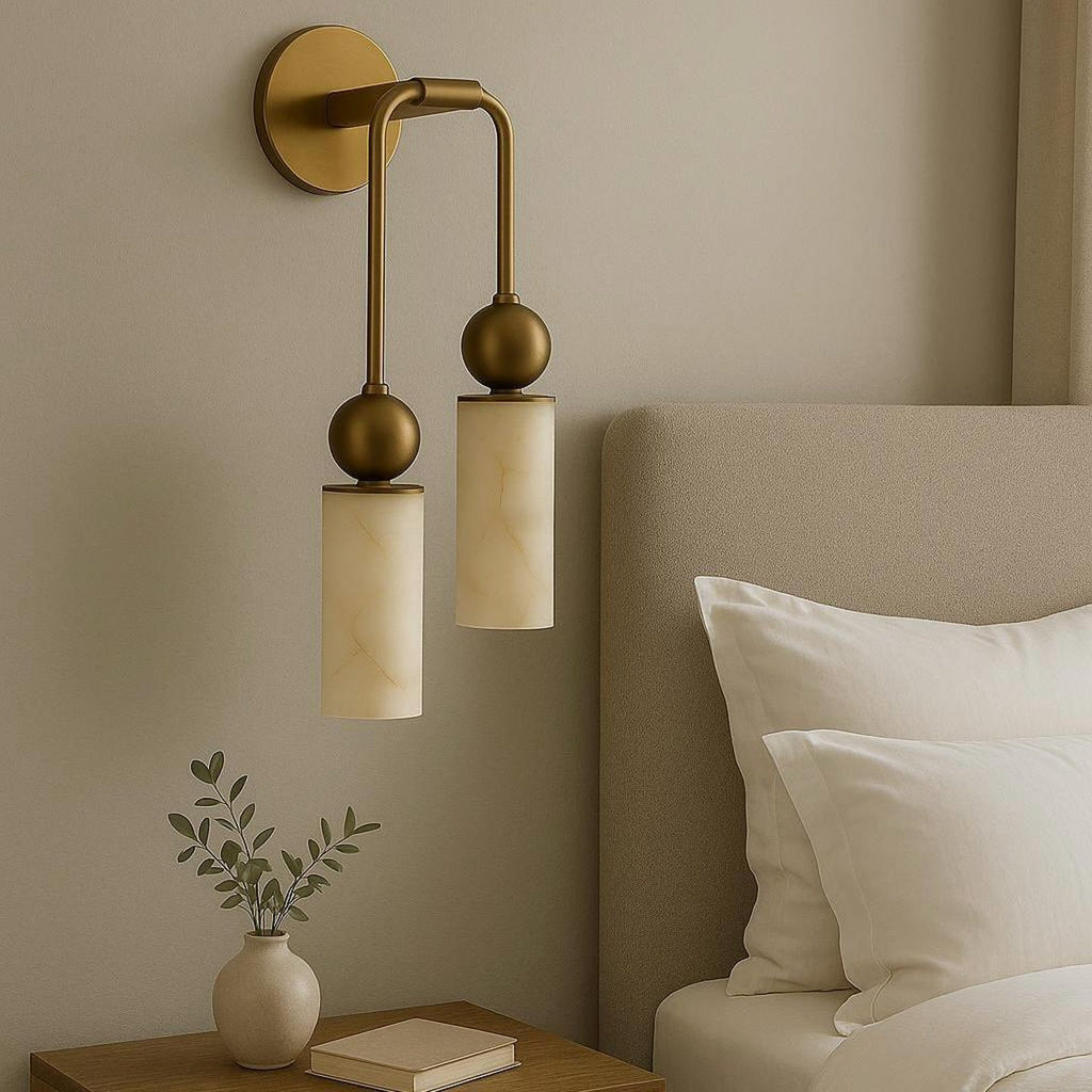 Double brass-tone wall lamp with two alabaster cylindrical shades