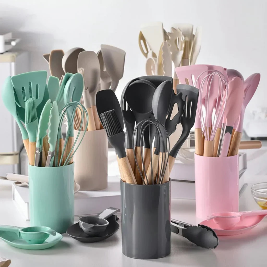 Silicone kitchen utensil set with wooden-effect handles and holder