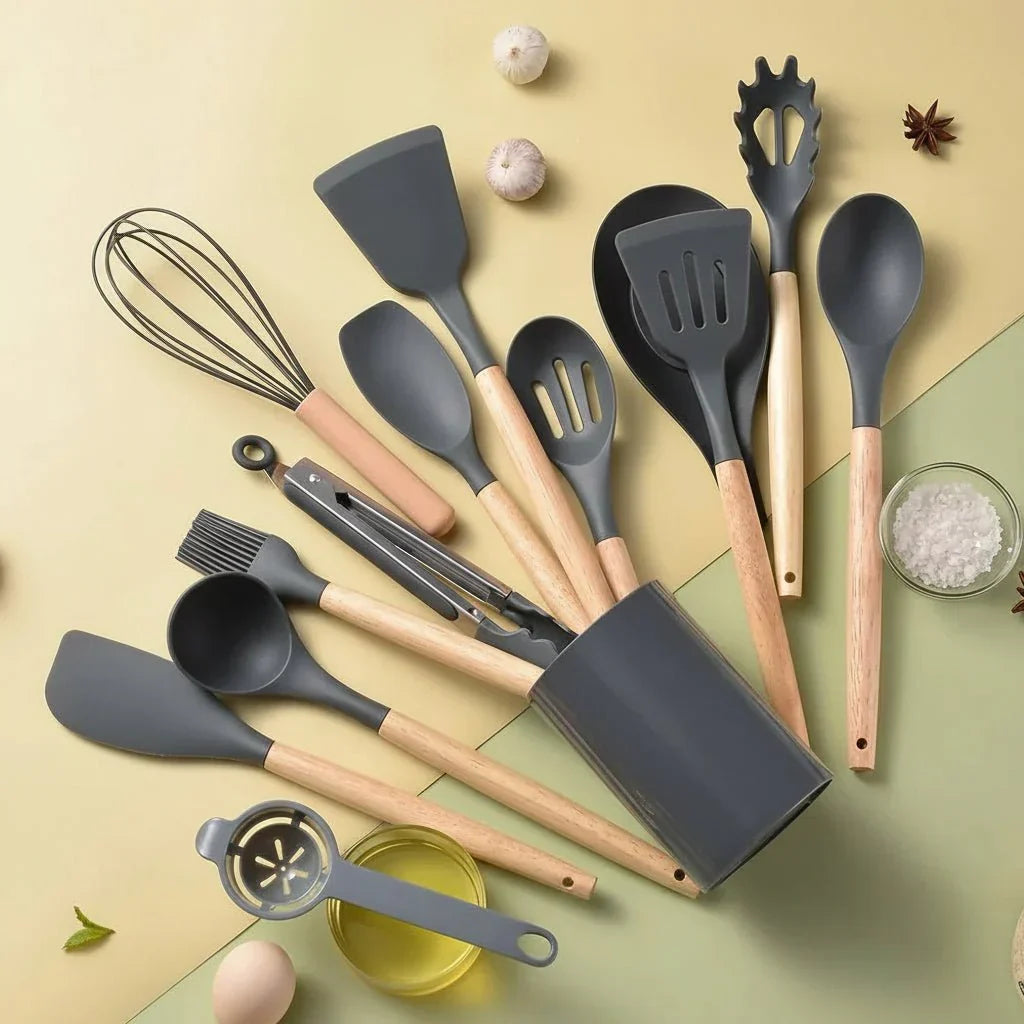 Silicone kitchen utensil set with wooden-effect handles and holder