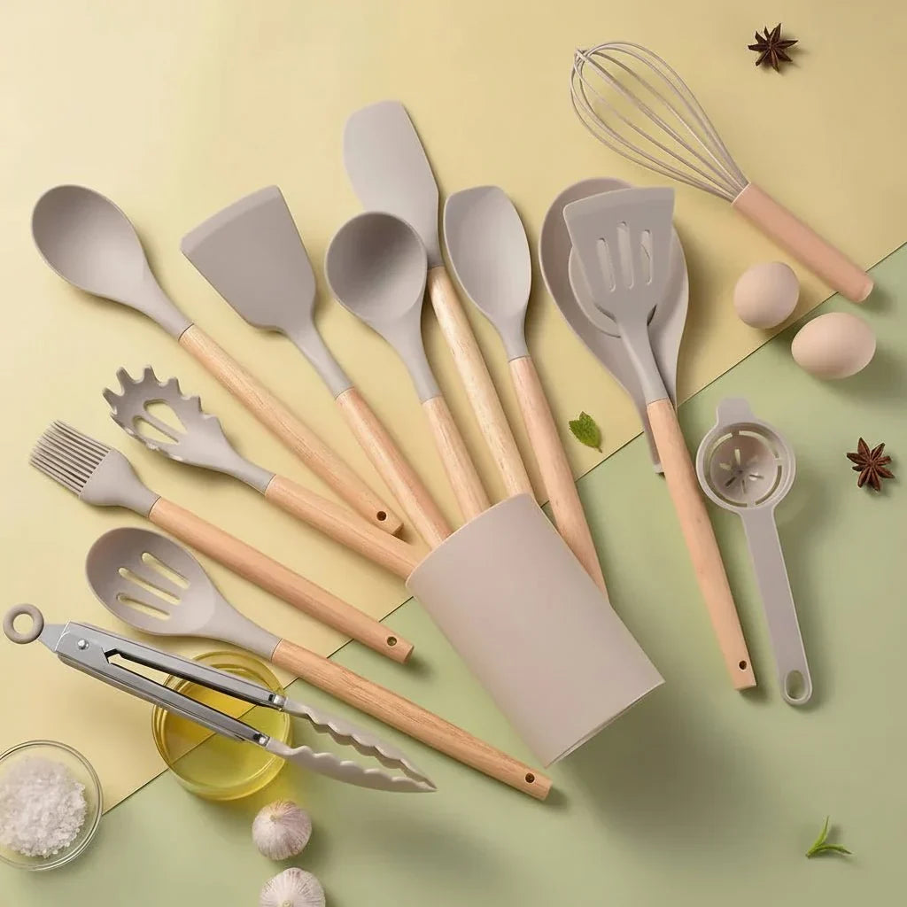 Silicone kitchen utensil set with wooden-effect handles and holder