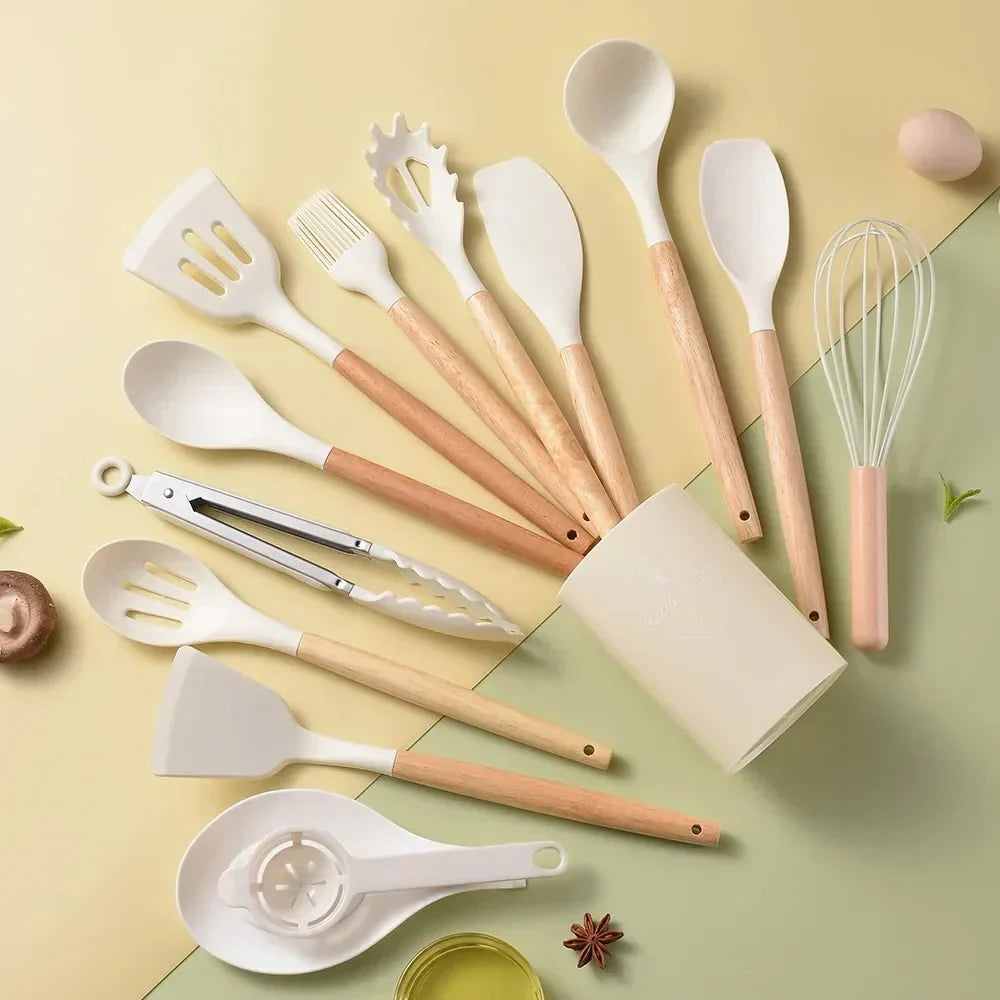 Silicone kitchen utensil set with wooden-effect handles and holder