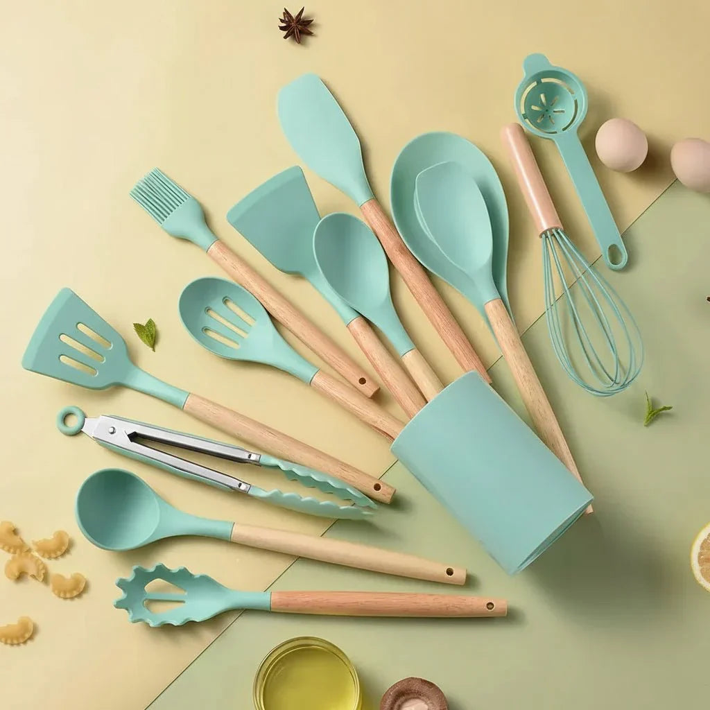 Silicone kitchen utensil set with wooden-effect handles and holder