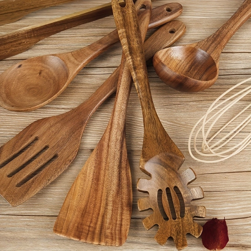 Seven-piece brown wooden kitchen utensil set with spoons, spatulas, tongs and whisk