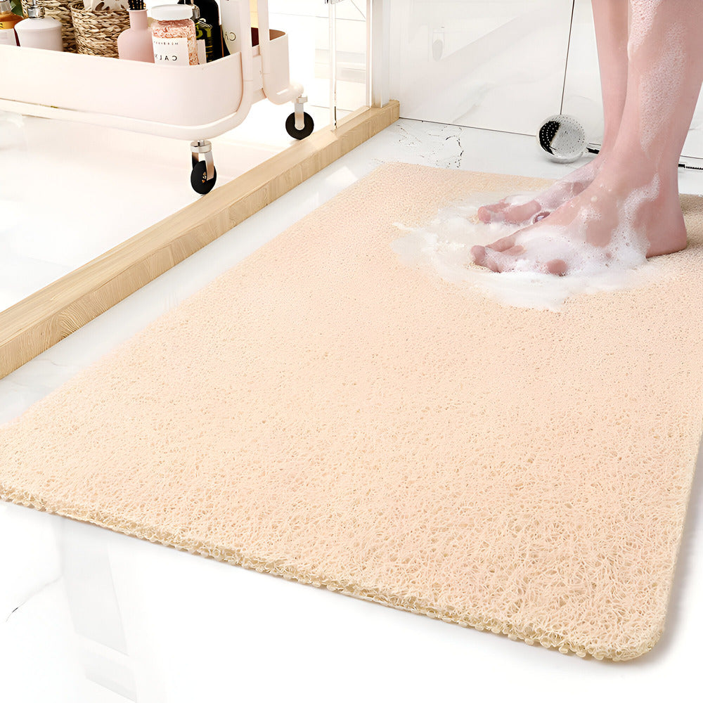 Rectangular textured bathroom mat with rounded corners
