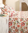 Cream floral bedsheet with matching quilted pillow covers