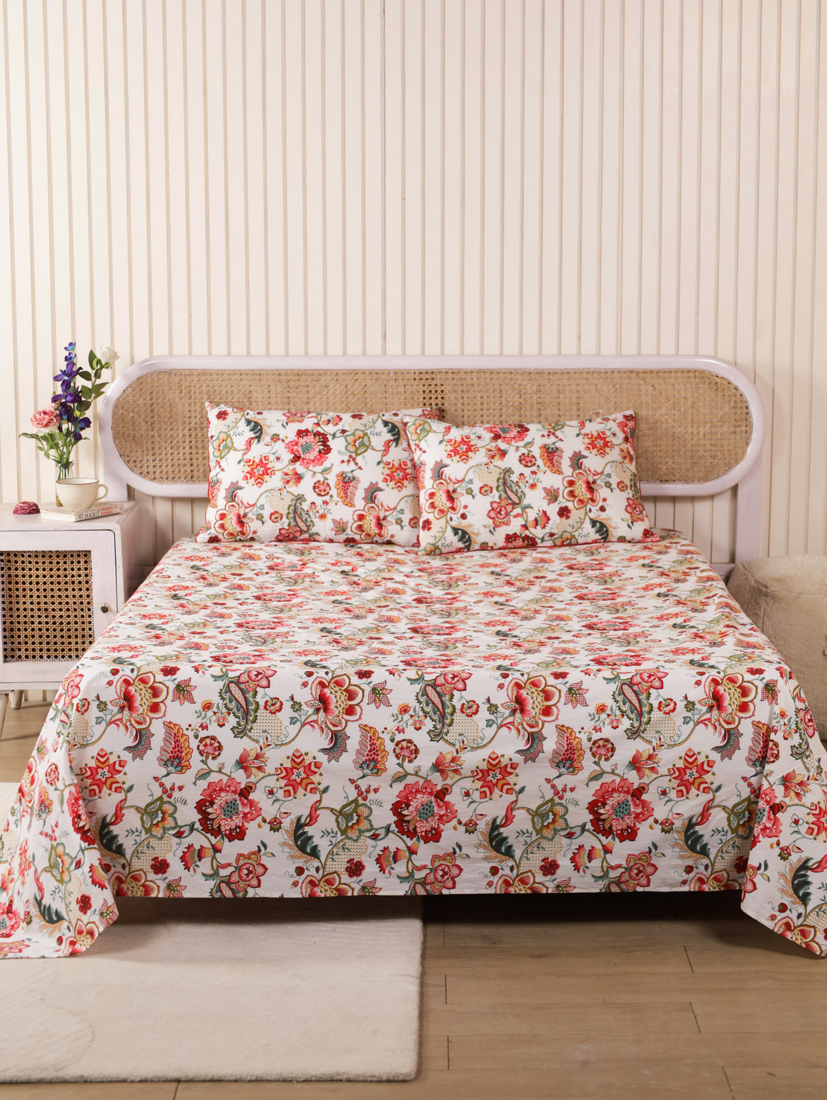 Cream floral bedsheet with matching quilted pillow covers