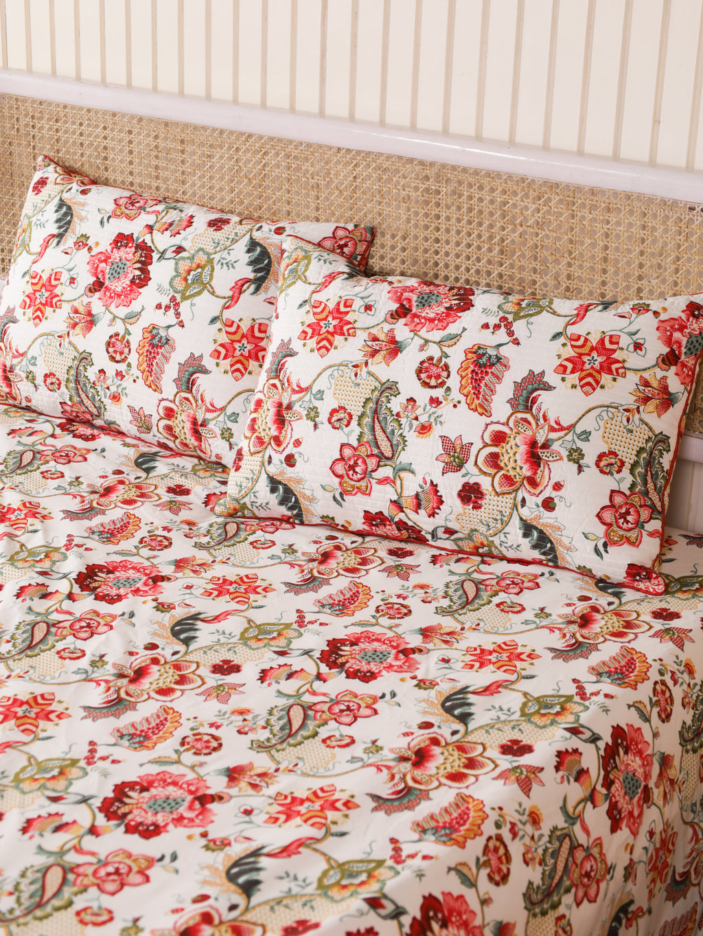Cream floral bedsheet with matching quilted pillow covers