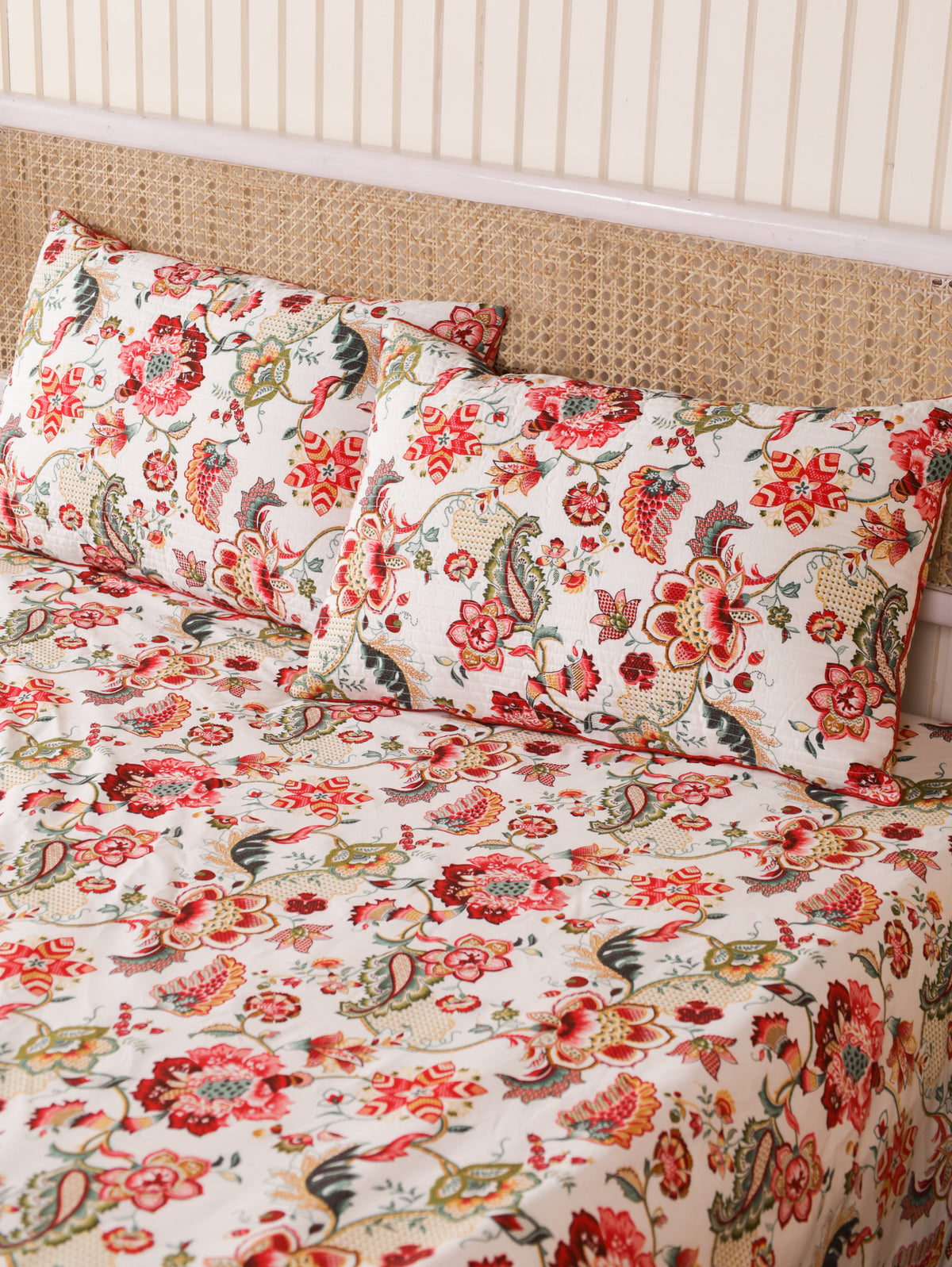 Cream floral bedsheet with matching quilted pillow covers