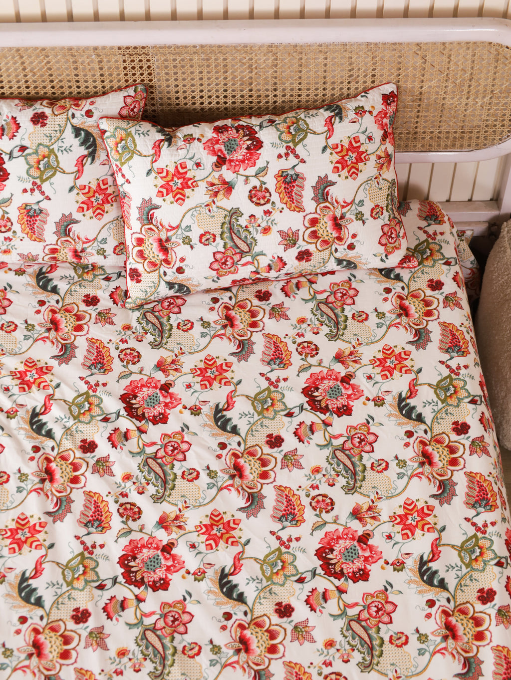 Cream floral bedsheet with matching quilted pillow covers