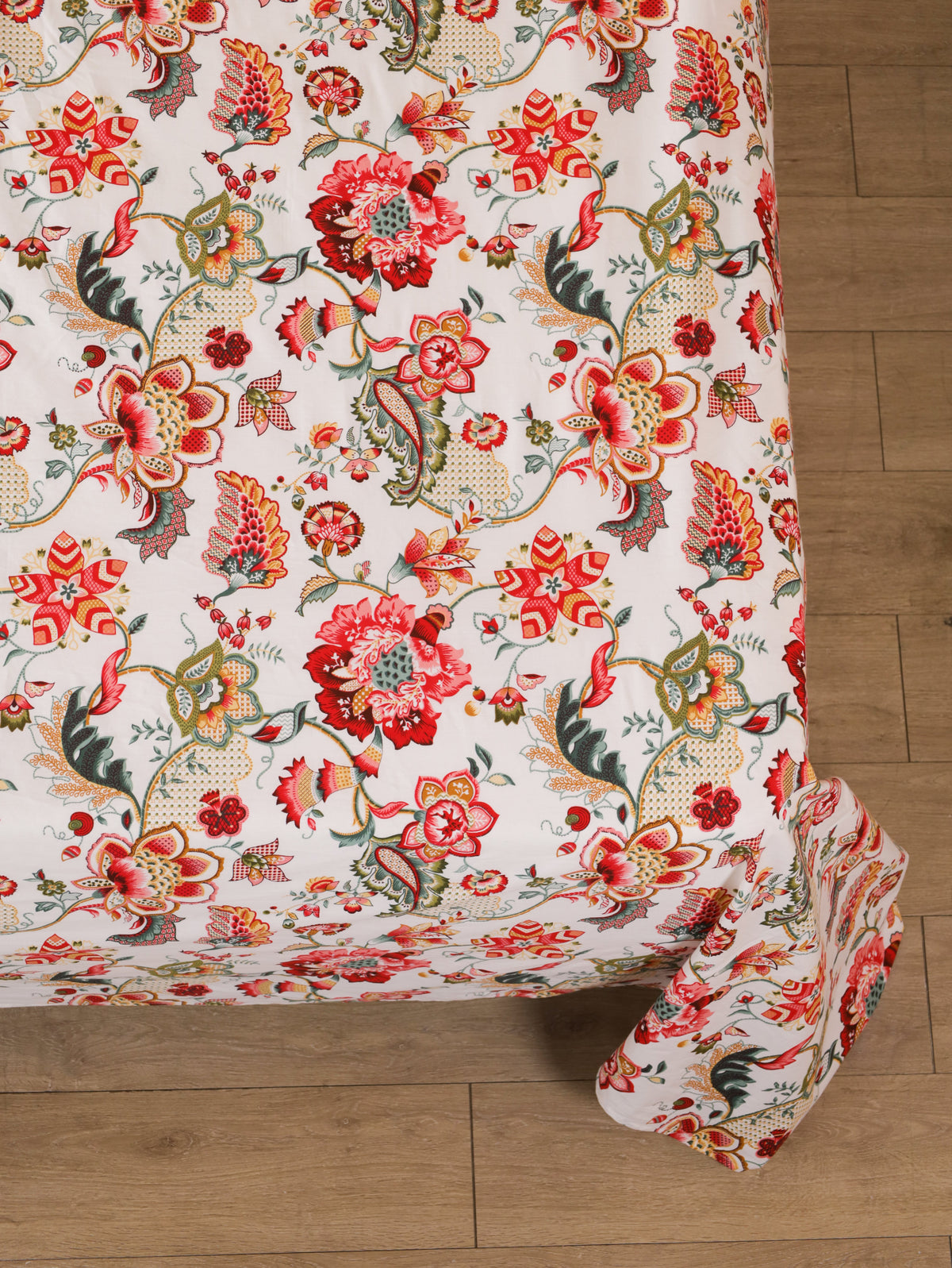 Cream floral bedsheet with matching quilted pillow covers