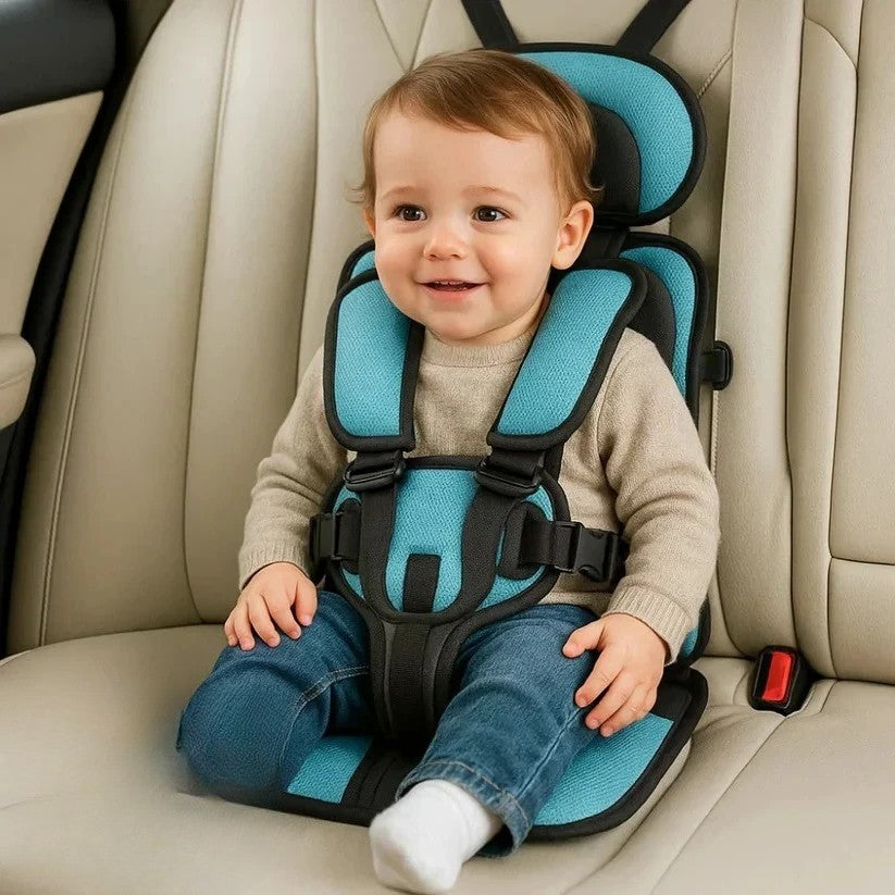 Foldable child car seat with harness straps fitted on a vehicle seat
