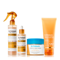 Four-piece kojic acid face and body care set with spray, serum, toner pads and body cream