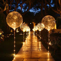 Clear balloons with warm white LED lights for party decoration