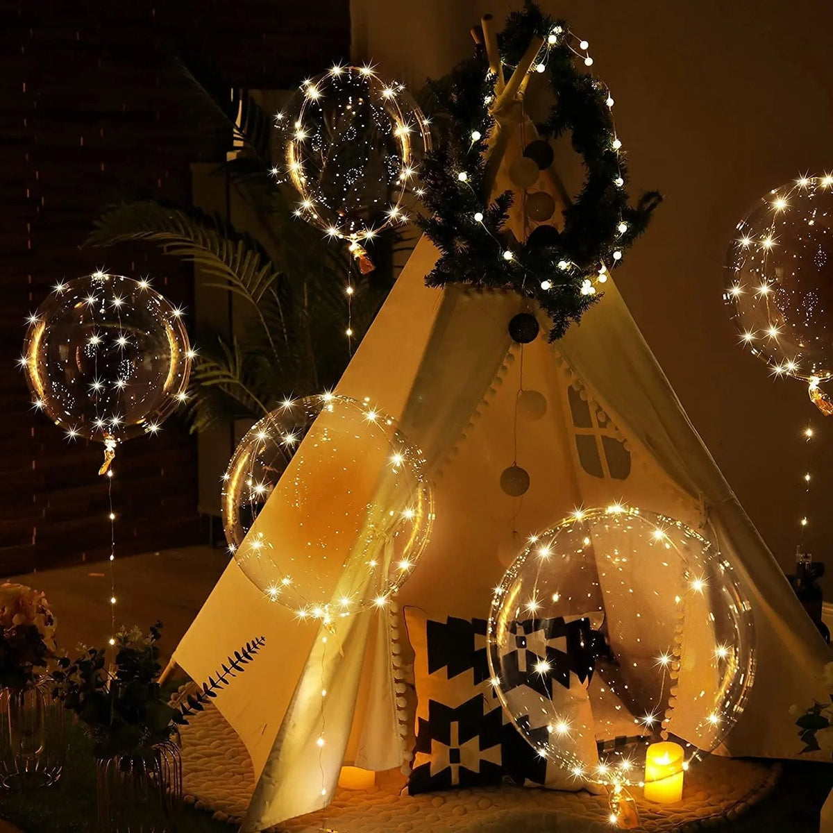 Clear balloons with warm white LED lights for party decoration