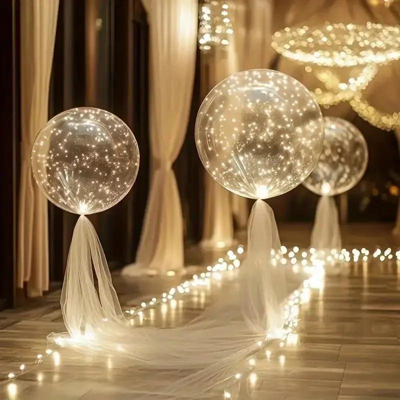 Clear balloons with warm white LED lights for party decoration