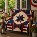 Quilted patchwork blanket with red blue and cream star design