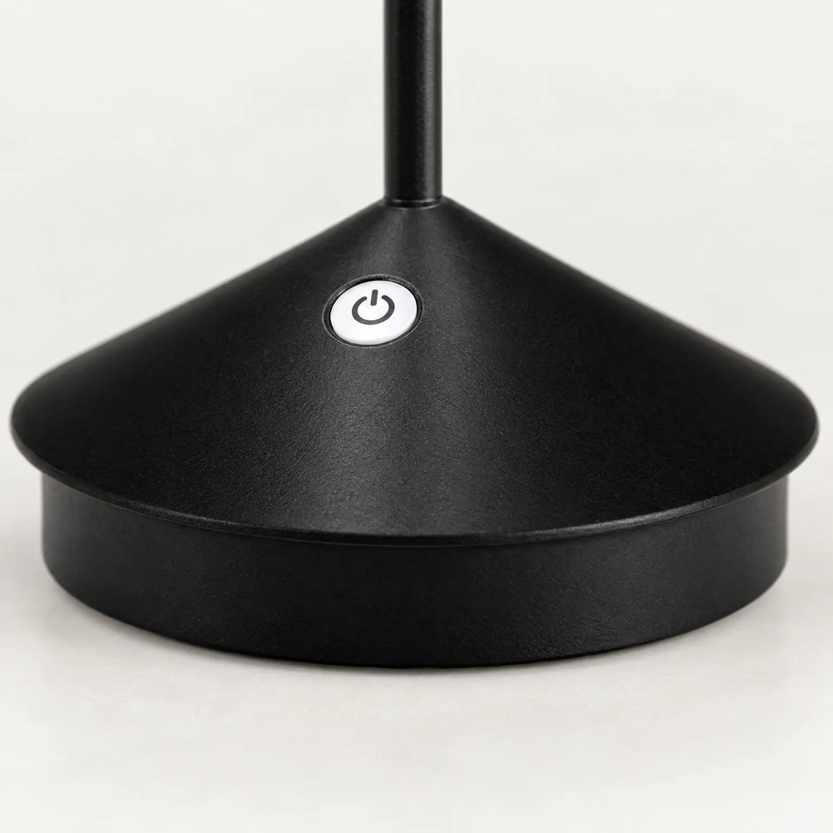 Cordless LED table lamp with slim stem and round base