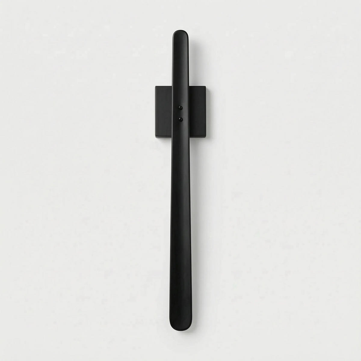 Magstep - Long Magnetic Wall-Mounted Shoehorn Putting On Shoes