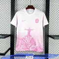 White Brazil football shirt with pink Christ the Redeemer graphic