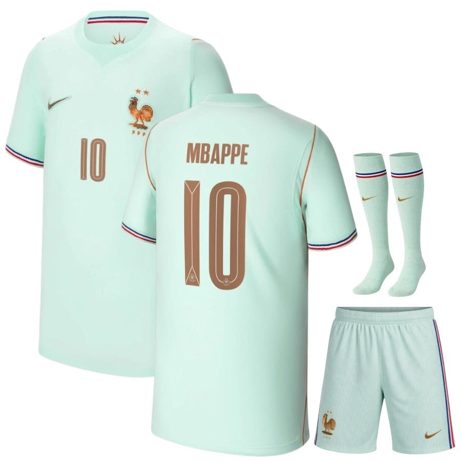 Pale green kids football kit with shirt, shorts and matching socks