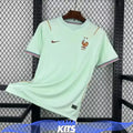 Green short-sleeve France FFF football shirt with striped cuffs