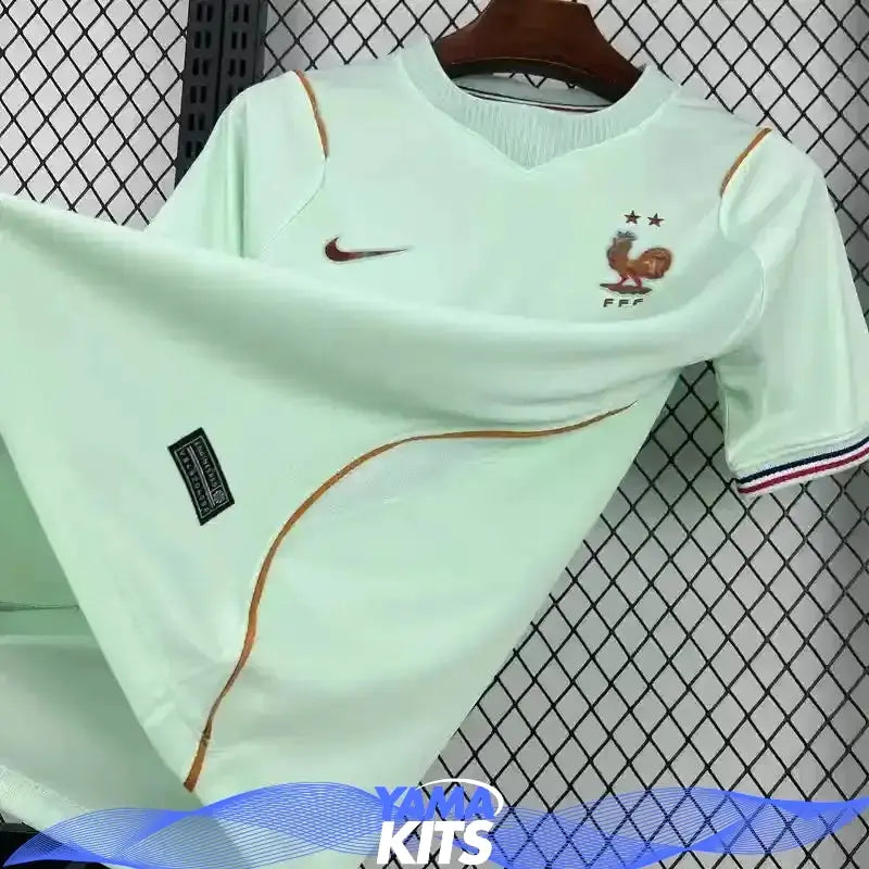 Green short-sleeve France FFF football shirt with striped cuffs
