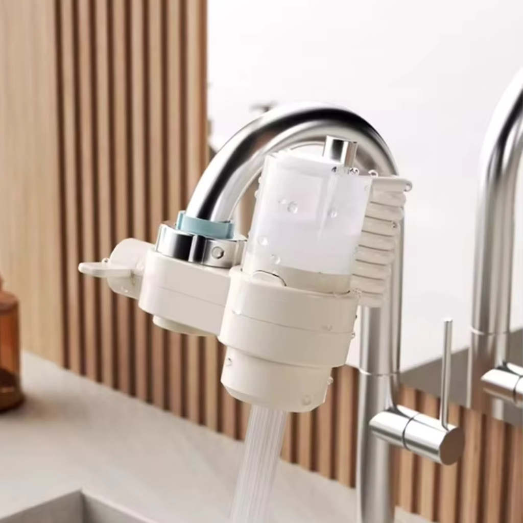 White faucet-mounted soap dispenser with integrated sponge holder