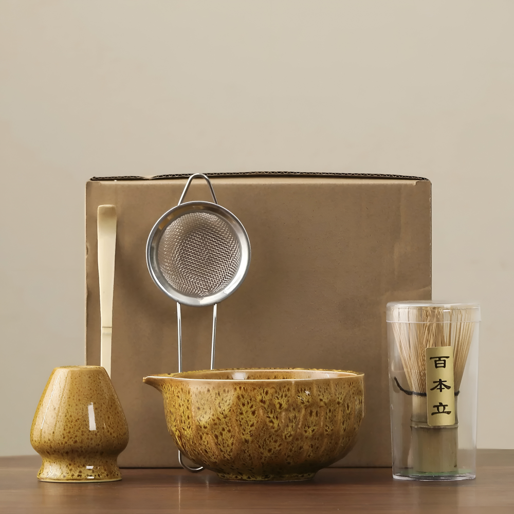 Ceramic mixing bowl with pouring spout and bamboo whisk