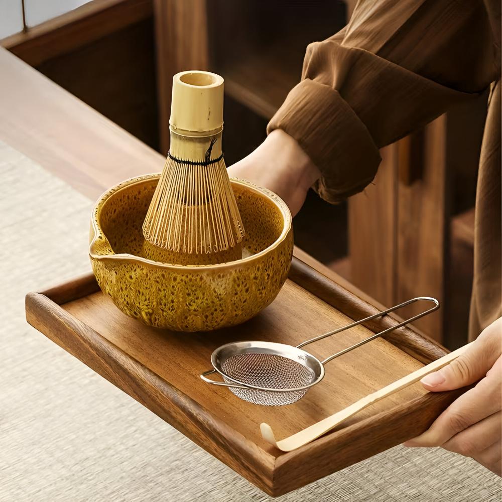 Ceramic mixing bowl with pouring spout and bamboo whisk