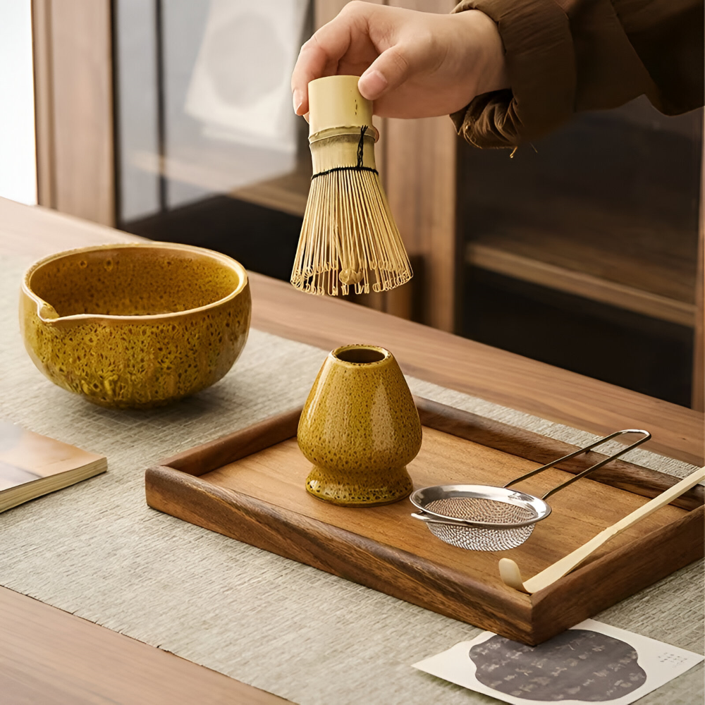 Ceramic mixing bowl with pouring spout and bamboo whisk