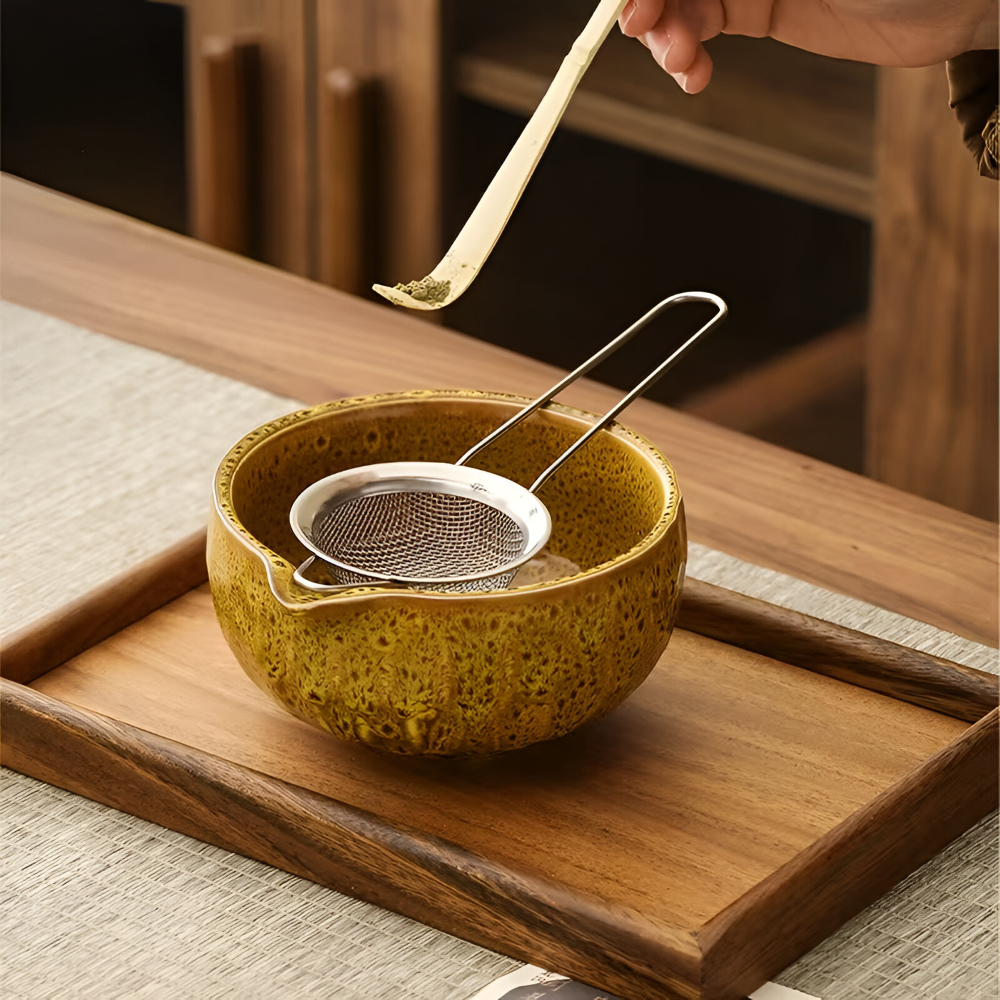 Ceramic mixing bowl with pouring spout and bamboo whisk