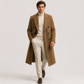 Long double-breasted trench coat with lapel collar and side pockets