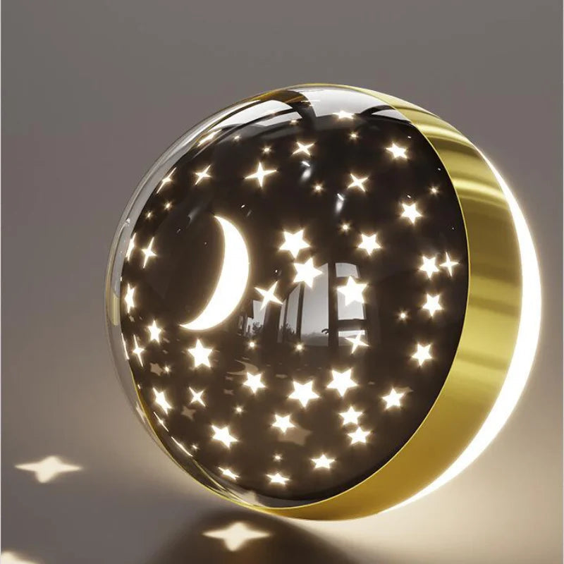 Modern wall light with circular ring, spherical lamp and celestial moon and star details
