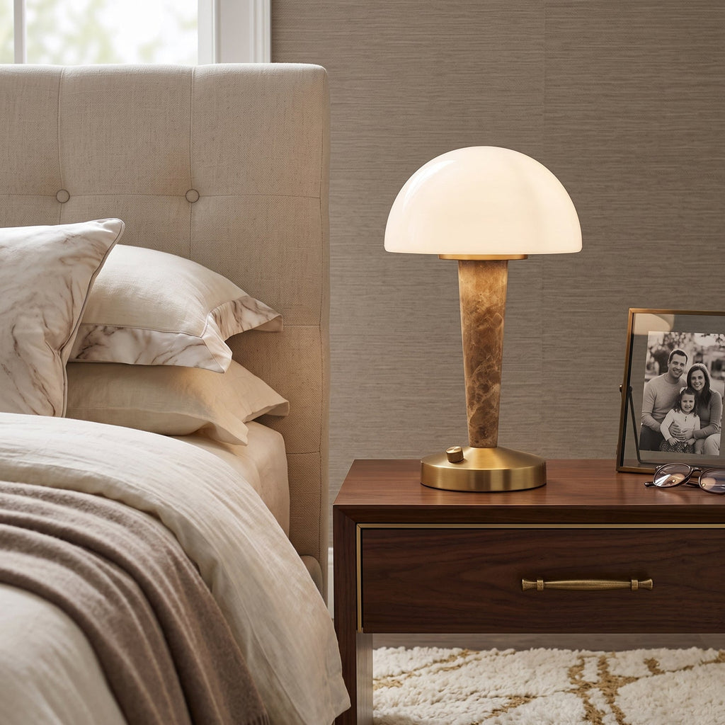 Table lamp with white dome shade, gold finish base and marble-effect stem