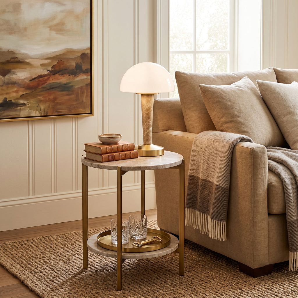 Table lamp with white dome shade, gold finish base and marble-effect stem
