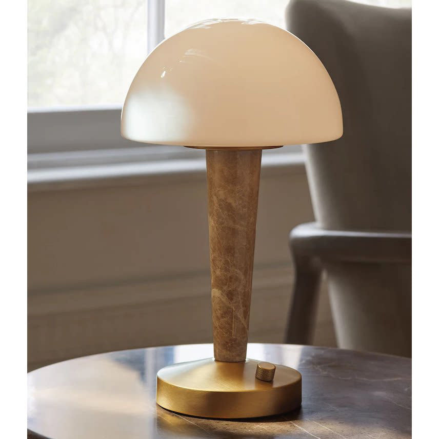 Table lamp with white dome shade, gold finish base and marble-effect stem
