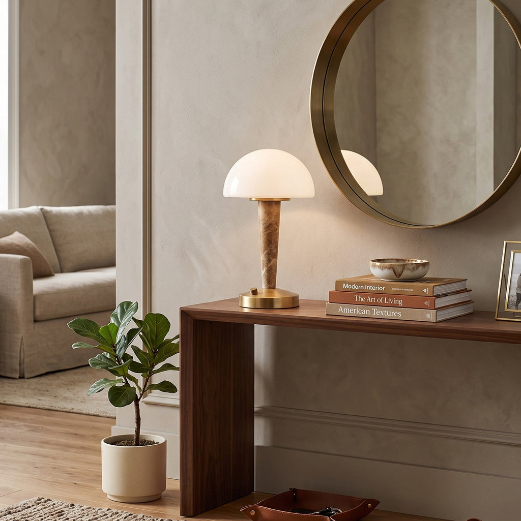 Table lamp with white dome shade, gold finish base and marble-effect stem