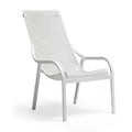 Perforated outdoor lounge chair with integrated arms and four legs