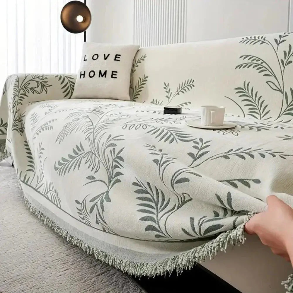 Chenille jacquard sofa cover with botanical leaf pattern and fringed edge