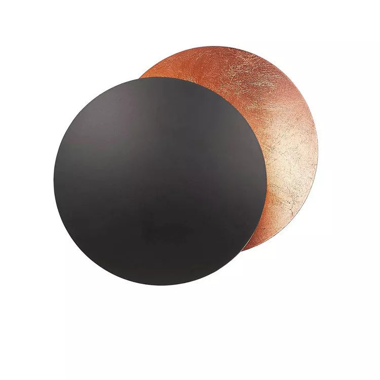 Layered circular LED wall light with an eclipse-inspired design